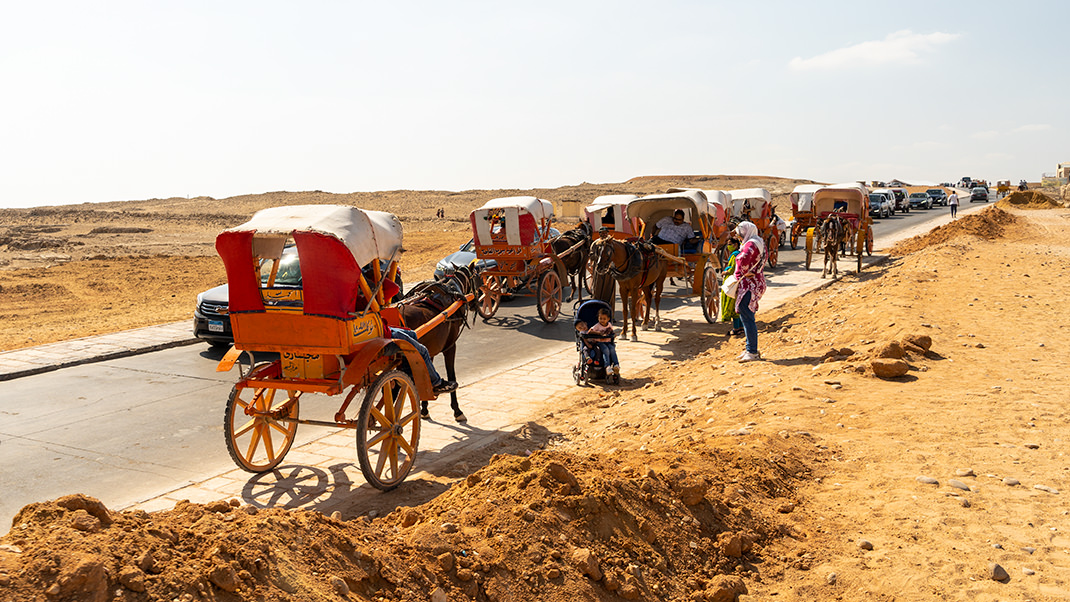You can choose to move around the area by taking a horse-drawn carriage or riding a camel