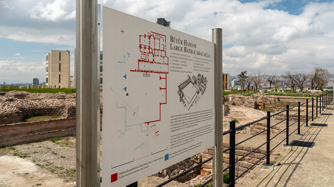 Information board with a plan