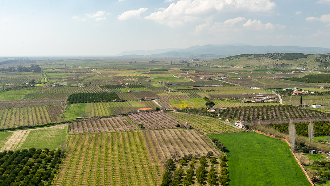 From the top, there is a breathtaking view of gardens and orchards