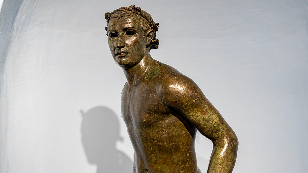 Statue of a running athlete. The object was found in the waters of the Aegean Sea
