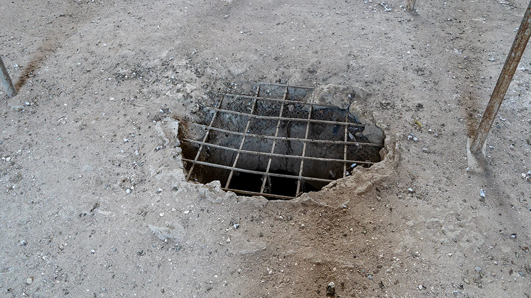 Hole in the floor. Below us is the burial vault