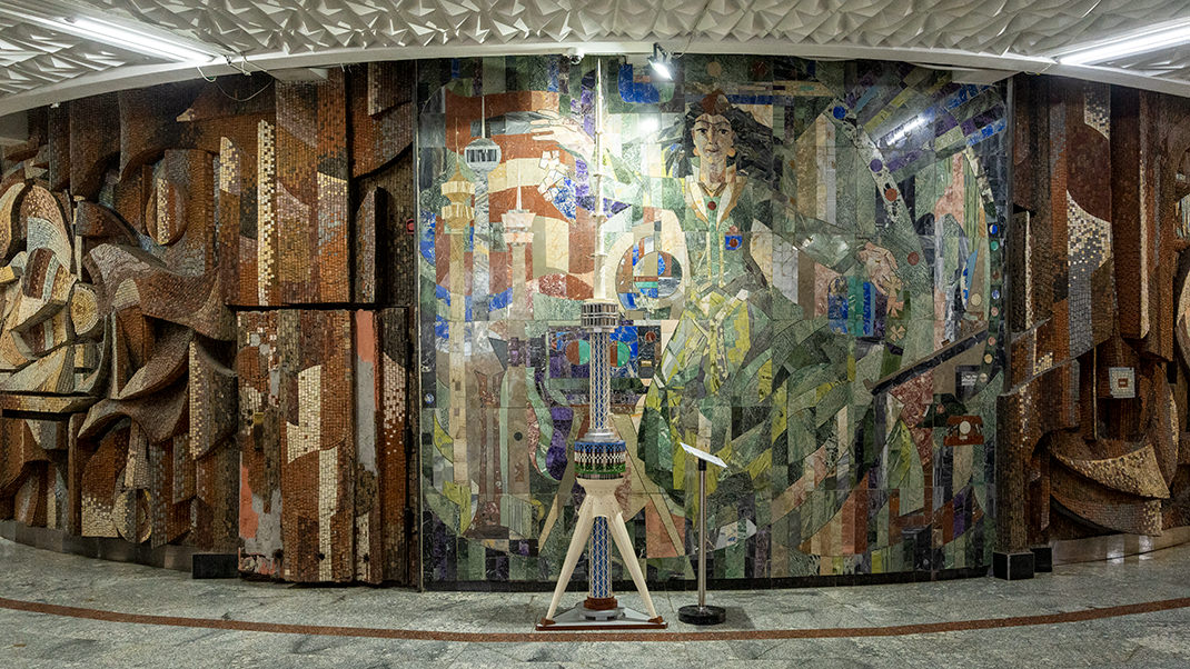 The area around the elevators is surrounded by a vibrant panel